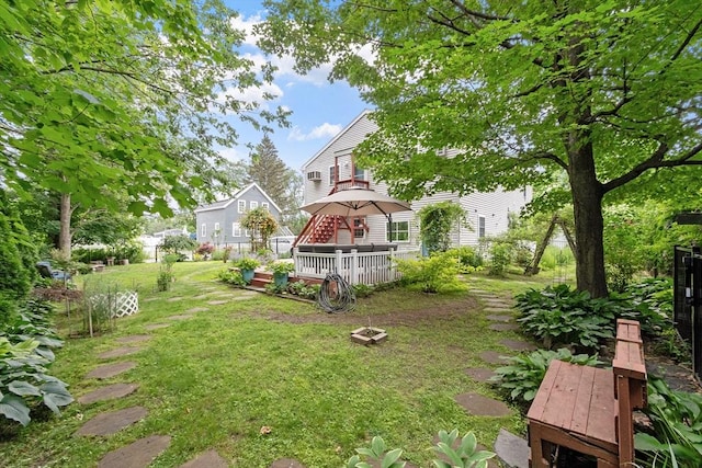 4 Fiske Ave, Chelmsford, MA 01863 - view of green lawn with a deck