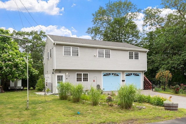 4 Fiske Ave, Chelmsford, MA 01863 - view of front of house with driveway and an attached garage
