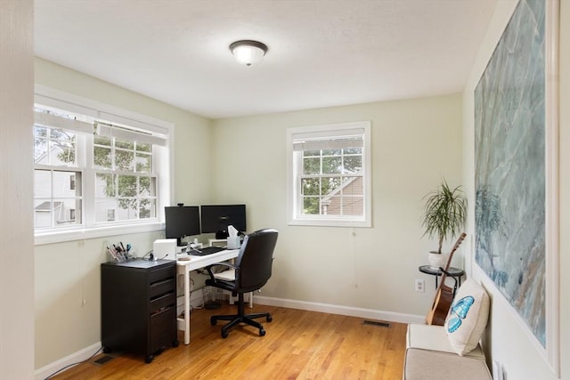 4 Fiske Ave, Chelmsford, MA 01863 - home office featuring plenty of natural light and light wood-type flooring