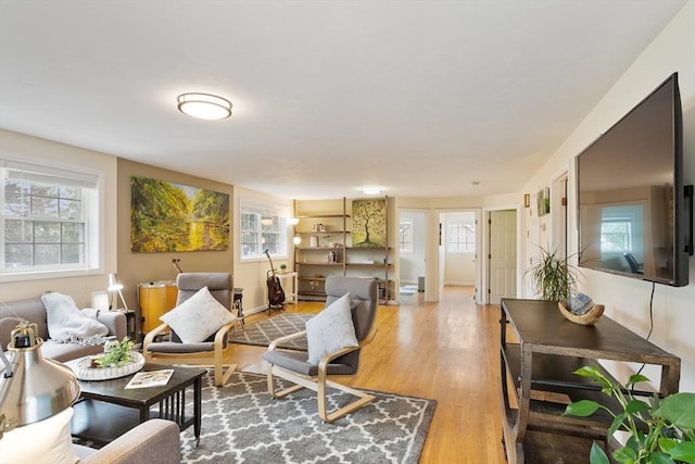 4 Fiske Ave, Chelmsford, MA 01863 - living room with plenty of natural light and light wood-style flooring