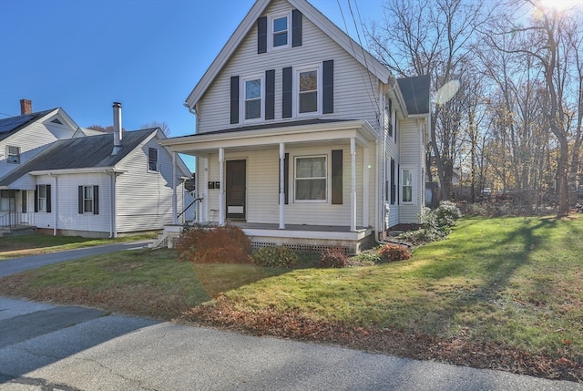 view of front of house featuring a porch and a front lawn