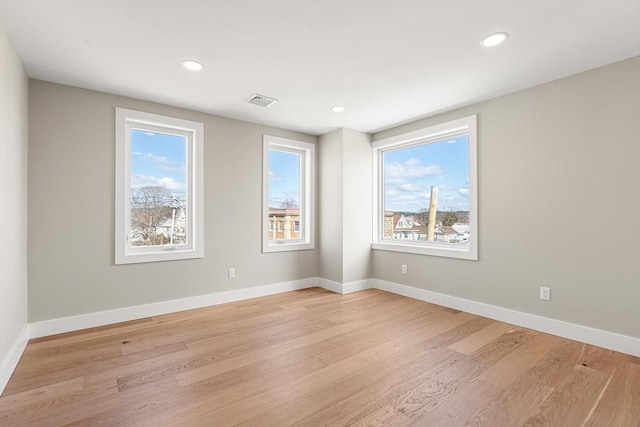308 Newton St, Waltham, MA 02453 - unfurnished room featuring light wood finished floors, recessed lighting, and baseboards