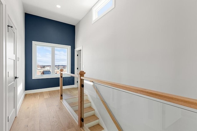308 Newton St, Waltham, MA 02453 - staircase with hardwood / wood-style flooring, healthy amount of natural light, recessed lighting, and baseboards