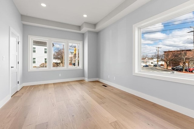 308 Newton St, Waltham, MA 02453 - unfurnished room with light wood-style flooring, baseboards, and recessed lighting