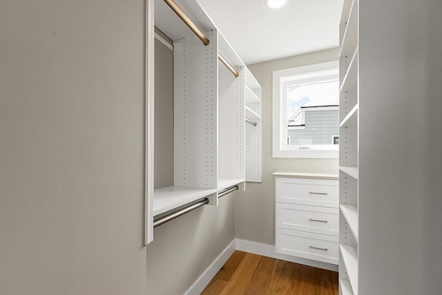 308 Newton St, Waltham, MA 02453 - walk in closet with dark wood finished floors