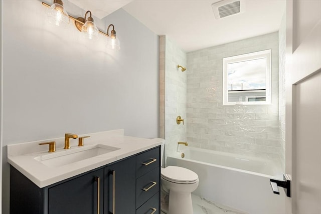 308 Newton St, Waltham, MA 02453 - full bathroom featuring vanity, shower / tub combination, toilet, and marble finish flooring
