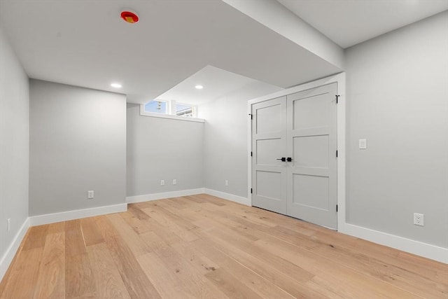 308 Newton St, Waltham, MA 02453 - additional living space with light wood-style flooring, baseboards, and recessed lighting