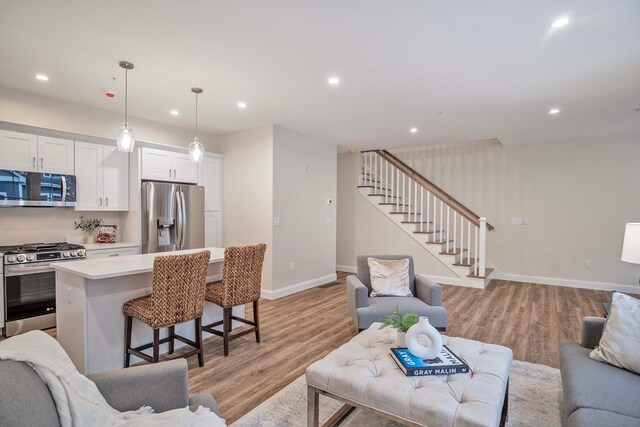 living room featuring light wood-type flooring