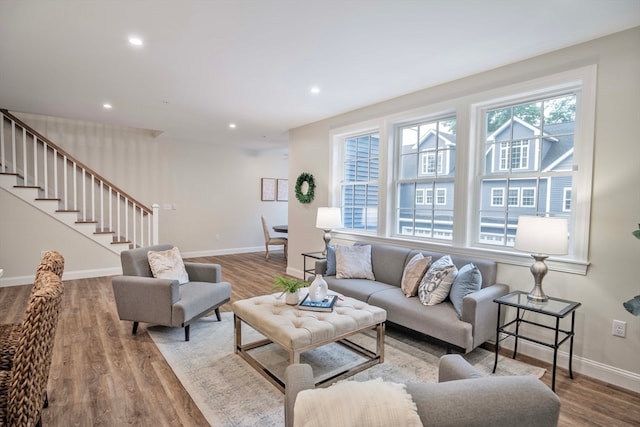 living room with light hardwood / wood-style flooring