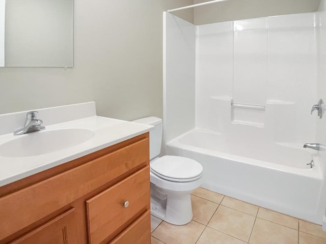 full bathroom with tile patterned floors, toilet, vanity, and bathing tub / shower combination