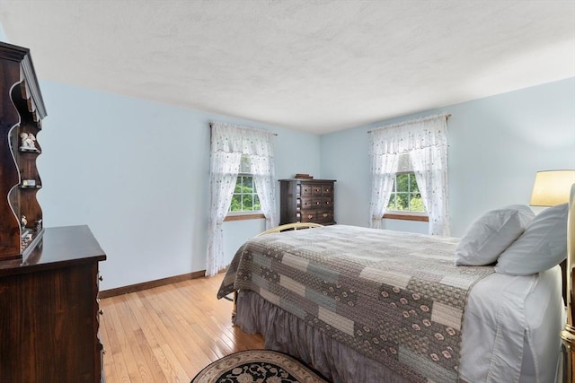 55 Glen Rd, Wilmington, MA 01887 - bedroom with light wood-style flooring and baseboards