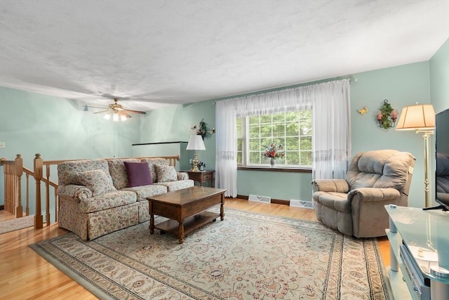 55 Glen Rd, Wilmington, MA 01887 - living area featuring wood finished floors, a ceiling fan, and baseboards