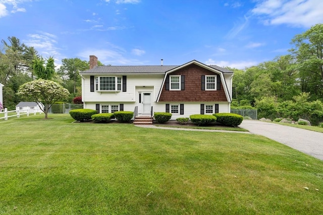 55 Glen Rd, Wilmington, MA 01887 - raised ranch with a chimney, a gambrel roof, and entry steps