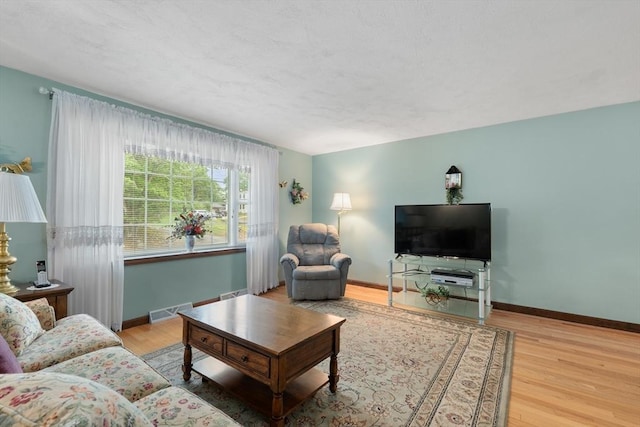 55 Glen Rd, Wilmington, MA 01887 - living room featuring wood finished floors and baseboards