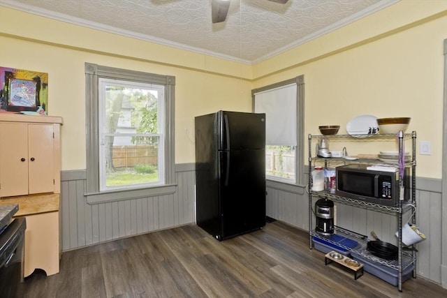 10 Dorchester, Springfield, MA 01109 - kitchen featuring freestanding refrigerator, stainless steel microwave, a wainscoted wall, dark wood-type flooring, and a ceiling fan