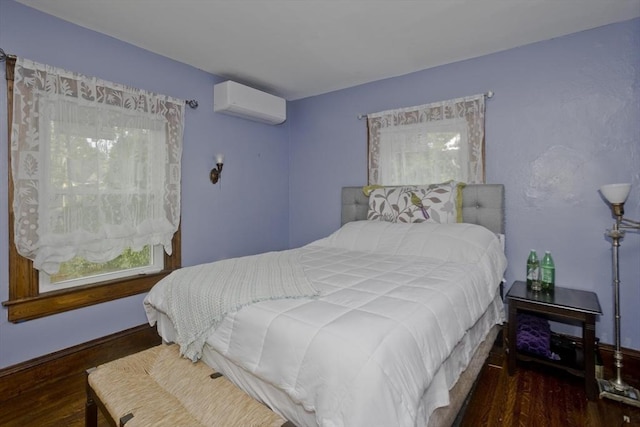 10 Dorchester, Springfield, MA 01109 - bedroom with an AC wall unit and wood finished floors