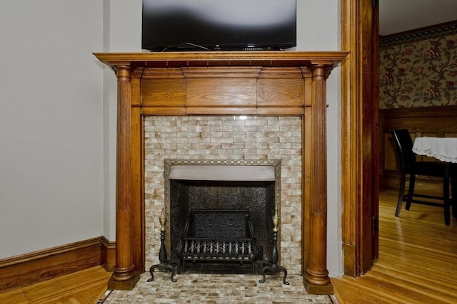 10 Dorchester, Springfield, MA 01109 - detailed view of wood finished floors and a tile fireplace