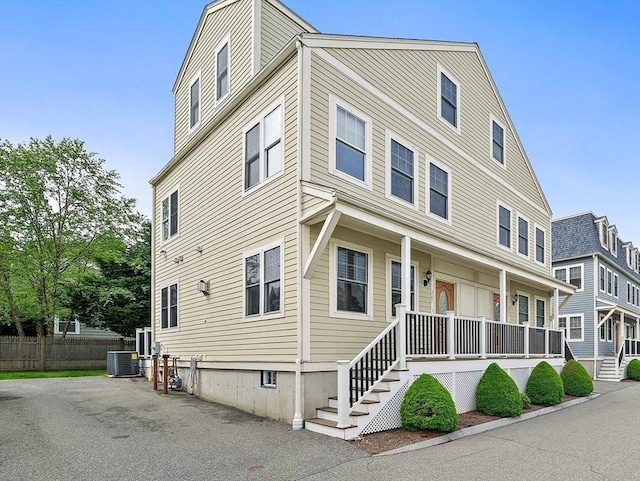 867 Adams St Unit 867, Boston, MA 02124 - view of front of property with central AC and a porch