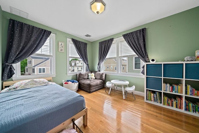 867 Adams St Unit 867, Boston, MA 02124 - bedroom with wood finished floors and baseboards