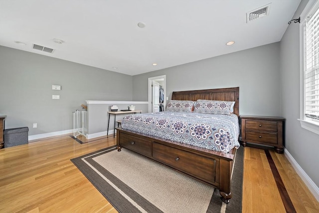 867 Adams St Unit 867, Boston, MA 02124 - bedroom with wood finished floors, baseboards, and recessed lighting