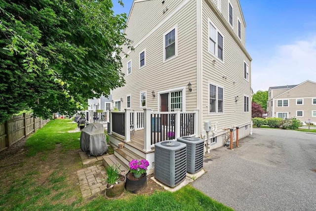 867 Adams St Unit 867, Boston, MA 02124 - rear view of property featuring central AC unit