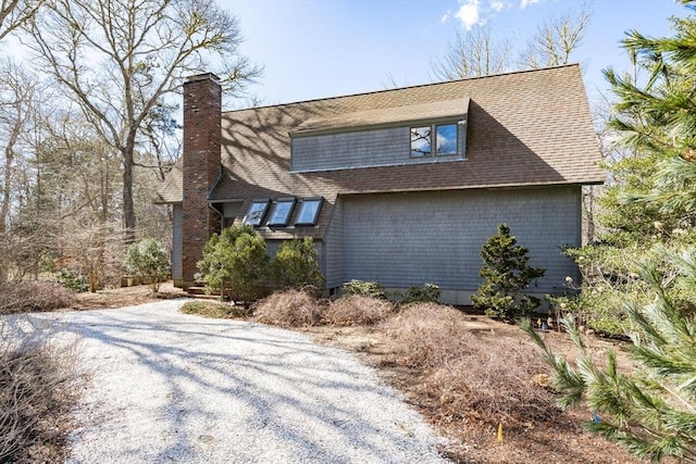 exterior space featuring a chimney