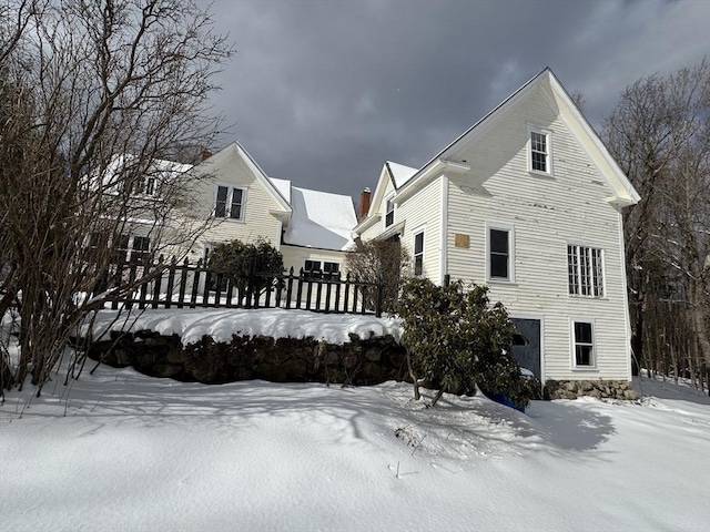 view of snow covered property