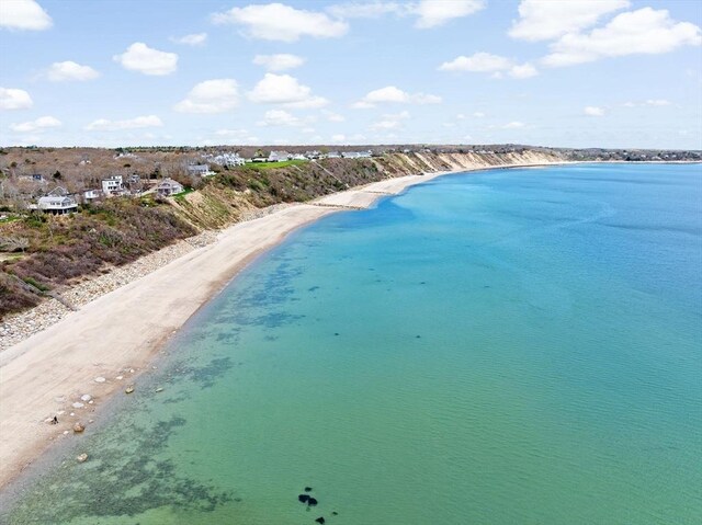 bird's eye view with a water view and a view of the beach