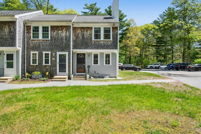 300 Falmouth Rd Unit 12E, Mashpee, MA 02649 - multi unit property featuring a chimney and a front lawn