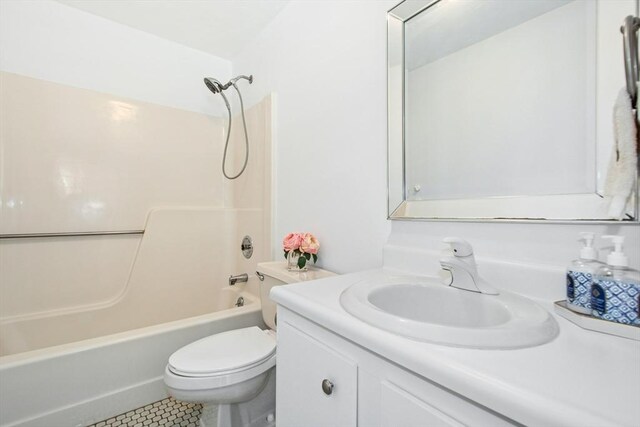 300 Falmouth Rd Unit 12E, Mashpee, MA 02649 - bathroom with toilet, vanity,  shower combination, and tile patterned flooring