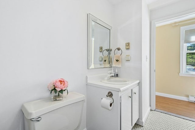 300 Falmouth Rd Unit 12E, Mashpee, MA 02649 - bathroom featuring toilet, vanity, baseboards, and tile patterned flooring