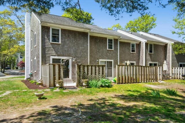300 Falmouth Rd Unit 12E, Mashpee, MA 02649 - back of property with a chimney