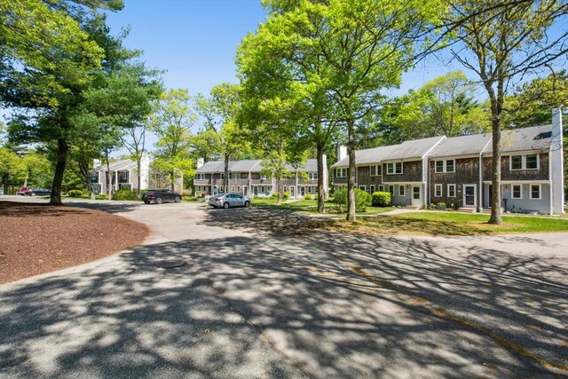 300 Falmouth Rd Unit 12E, Mashpee, MA 02649 - view of property's community featuring a residential view and uncovered parking