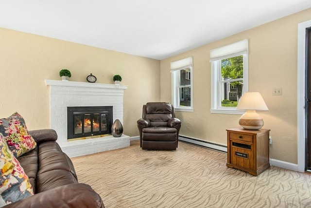 300 Falmouth Rd Unit 12E, Mashpee, MA 02649 - carpeted living area featuring a baseboard radiator, a fireplace, and baseboards