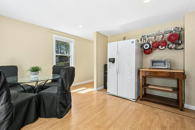 300 Falmouth Rd Unit 12E, Mashpee, MA 02649 - dining area featuring light wood finished floors, baseboards, and recessed lighting