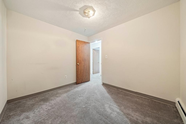 unfurnished room with a textured ceiling, carpet, baseboards, and baseboard heating
