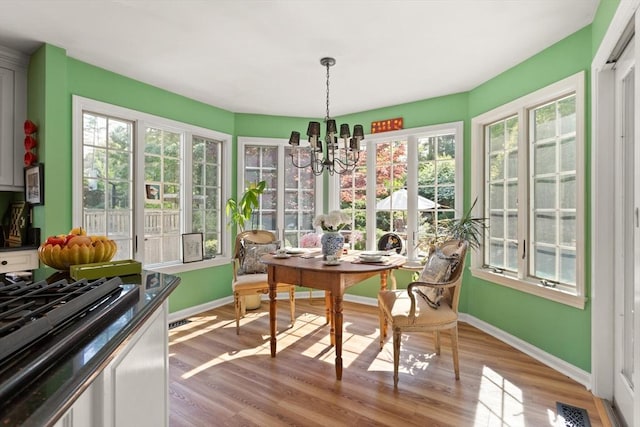 29 Stop River Rd, Norfolk, MA 02056 - sunroom / solarium with a chandelier, baseboards, french doors, and wood finished floors