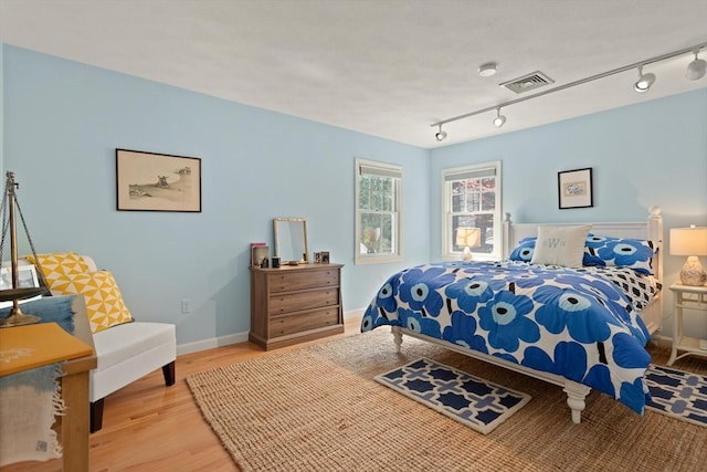 29 Stop River Rd, Norfolk, MA 02056 - bedroom featuring wood finished floors, track lighting, and baseboards