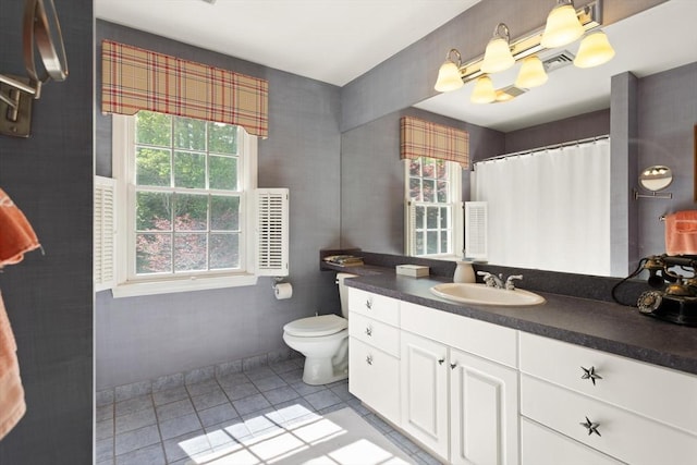 29 Stop River Rd, Norfolk, MA 02056 - bathroom featuring healthy amount of natural light, tile patterned flooring, toilet, and vanity