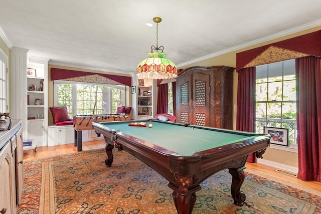 29 Stop River Rd, Norfolk, MA 02056 - rec room with light wood-style flooring, billiards table, crown molding, healthy amount of natural light, and built in shelves