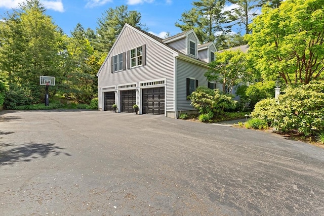 29 Stop River Rd, Norfolk, MA 02056 - view of home's exterior with a garage and driveway
