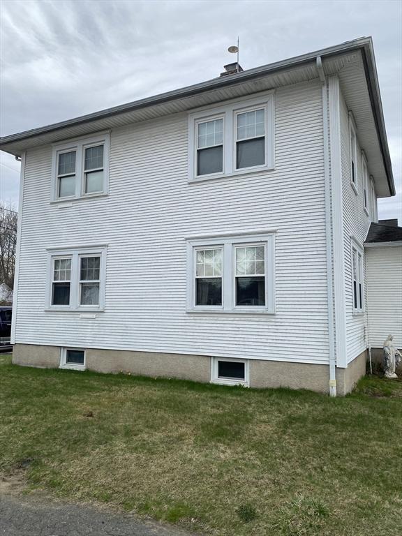 7 Exchange St, Westfield, MA 01085 - view of home's exterior with a lawn