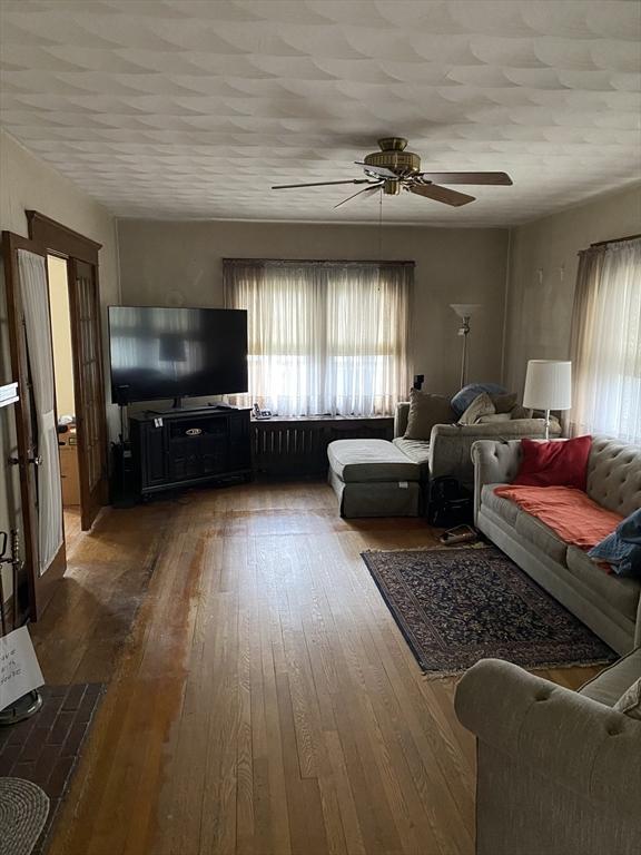 7 Exchange St, Westfield, MA 01085 - living area featuring ceiling fan and hardwood / wood-style floors