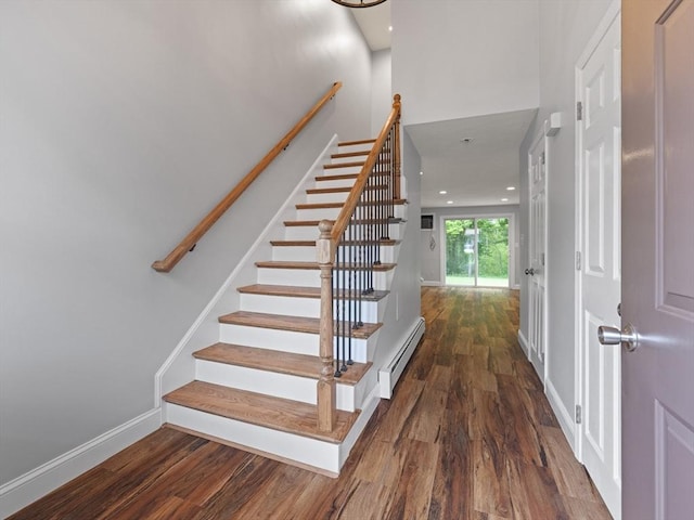 48 Decarolis Dr Unit 48, Tewksbury, MA 01876 - staircase featuring wood finished floors and a baseboard radiator