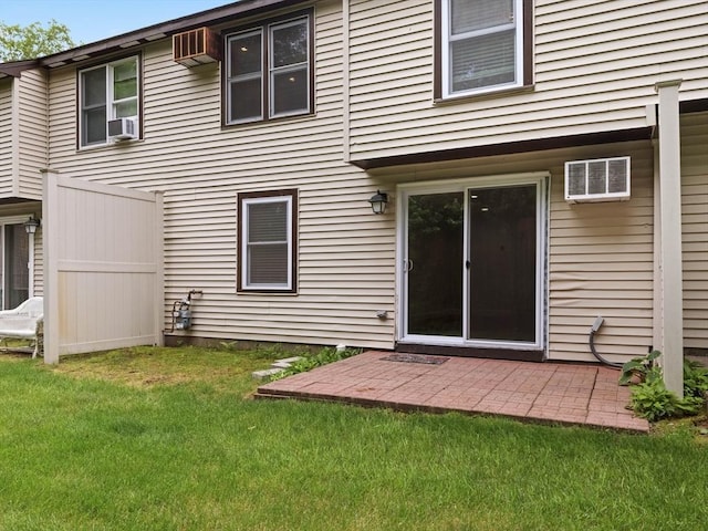 48 Decarolis Dr Unit 48, Tewksbury, MA 01876 - back of house with a yard, cooling unit, and a patio area