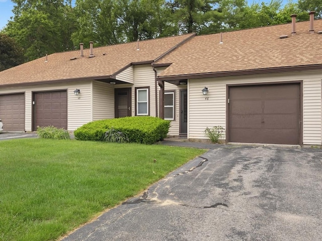 48 Decarolis Dr Unit 48, Tewksbury, MA 01876 - view of front facade with a shingled roof, a front lawn, and driveway