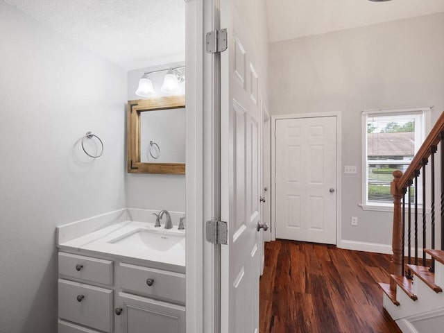 48 Decarolis Dr Unit 48, Tewksbury, MA 01876 - bathroom featuring wood finished floors and vanity