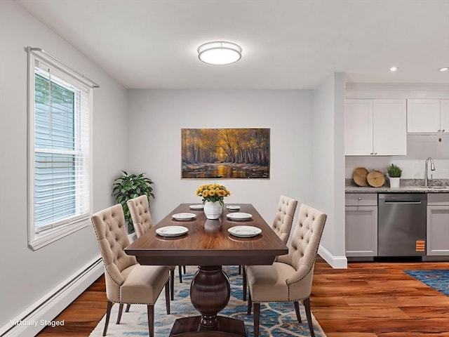 48 Decarolis Dr Unit 48, Tewksbury, MA 01876 - dining room featuring a baseboard heating unit, wood finished floors, and recessed lighting