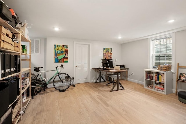 game room with an office area, light wood-style floors, recessed lighting, and baseboards