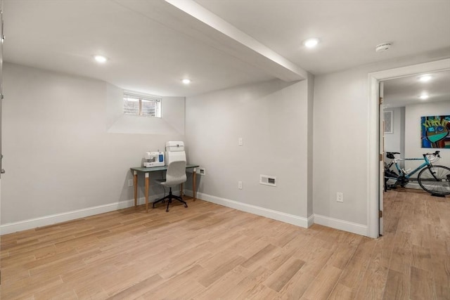 office with light wood finished floors, baseboards, and recessed lighting